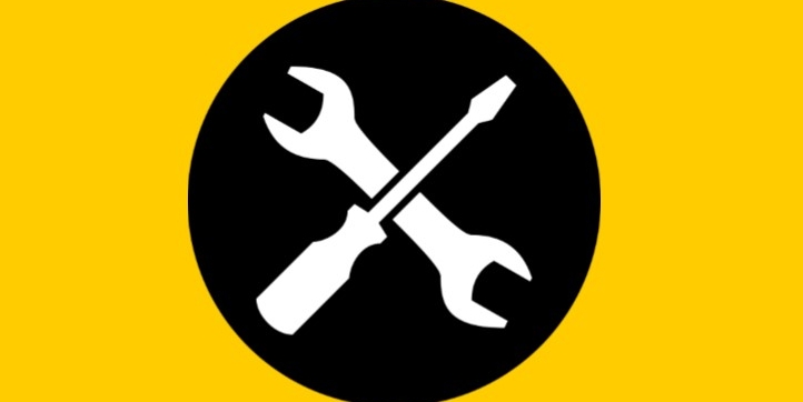Symbolgrafik für technisches Problem - schwarzer Kreis vor gelbem Hintergrund, davor in Weiss Schraubendreher und Schraubenzieher